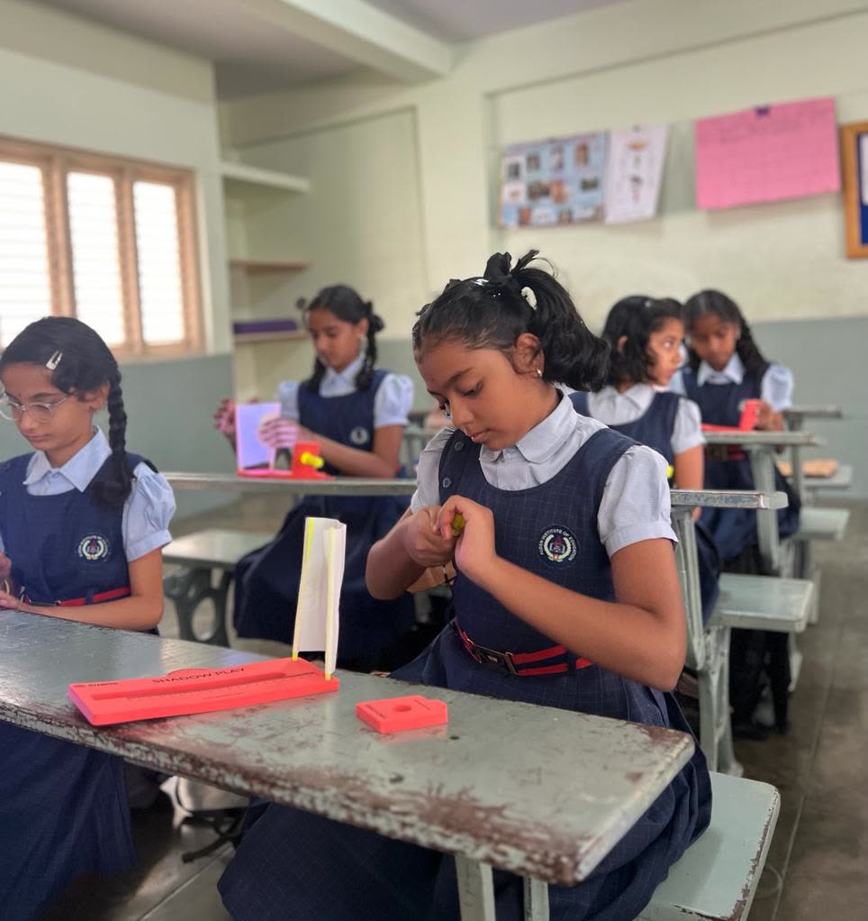 School students building with hands-on STEM learning kits